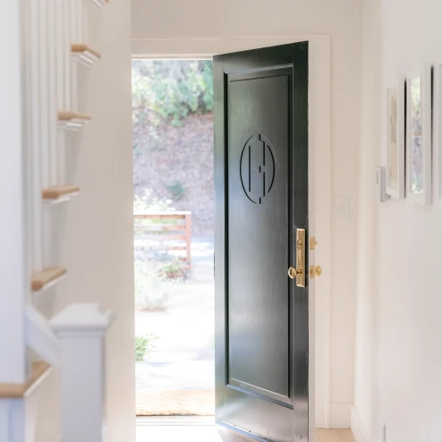 Black front door that is open